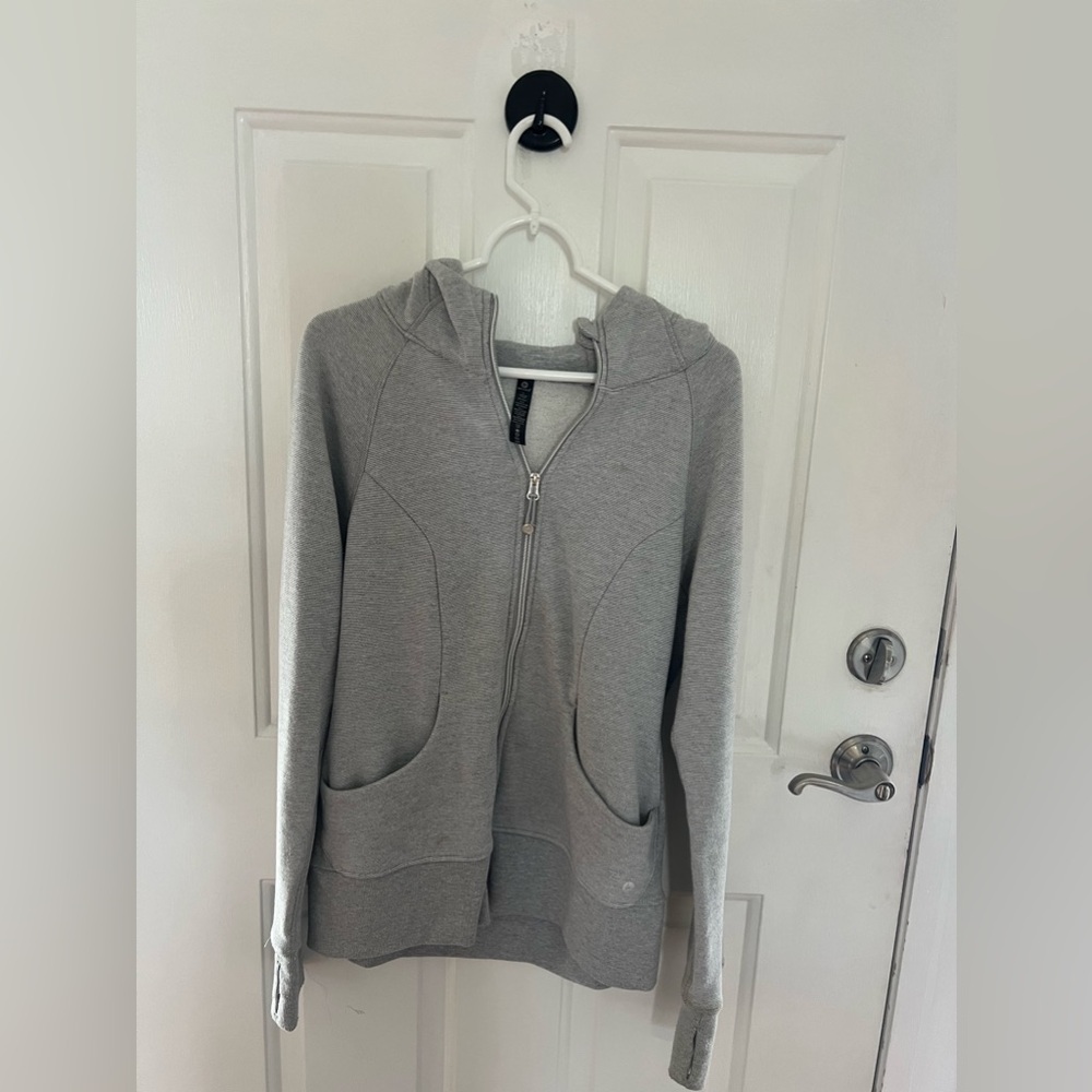 Grey athletic zip up sweatshirt. Size large